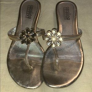 Gold sandals with rhinestone flower accents
